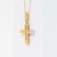 Dije de Cruz con cadena. Oro Amarillo 14K. Medida 45 cm.